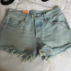 Brand new high waisted Levi cutoff shirts